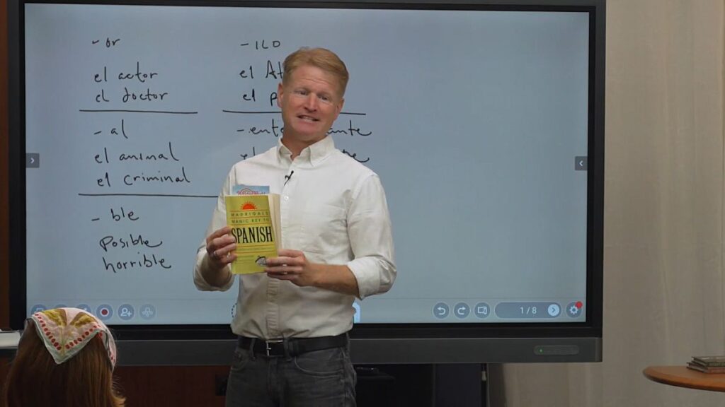 Dwane Thomas teaching Spanish on a whiteboard